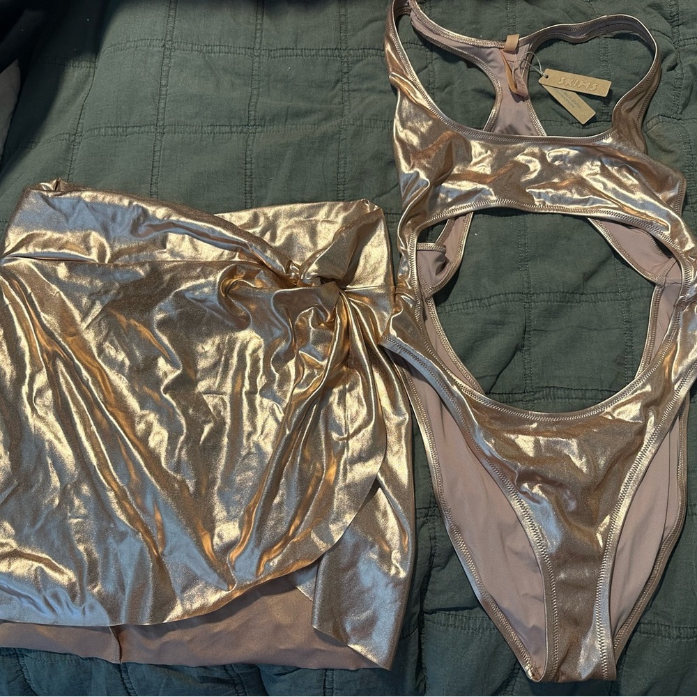 SKIMS rose gold metallic monokini and matching skirt. NWT size large